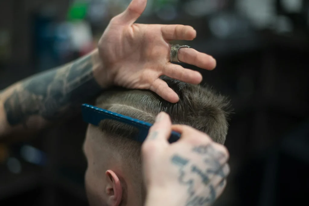 Close-up of a Barber Cutting Hair