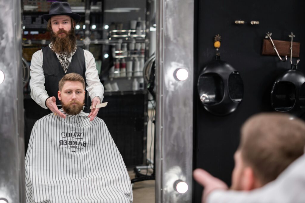 Barber Shampooing Client's Hair