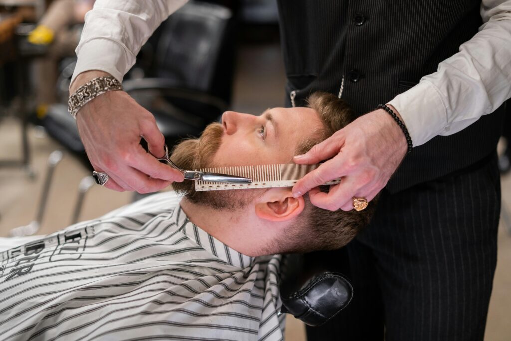 Barber Applying Hair Product