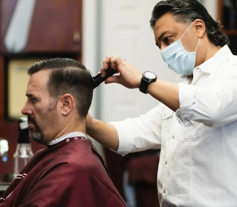 Man Receiving a Haircut